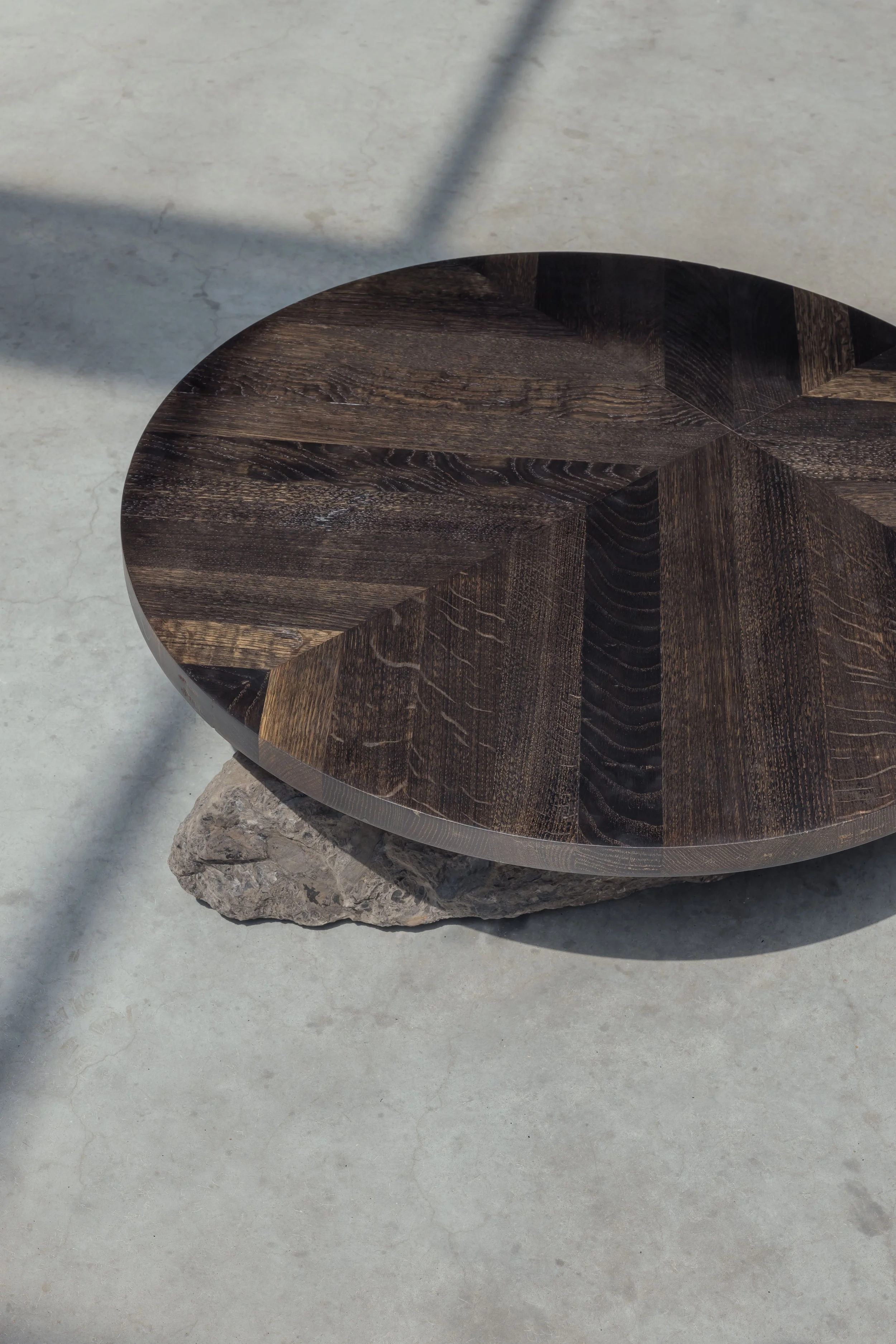 The sculptural collection, named "Zwart Goud," features a stone sourced from the coal mine of Houthalen, the birthplace of designer Dries Truyers.

The mine stone symbolizes the history of the coal mining industry and its consequences, representing a