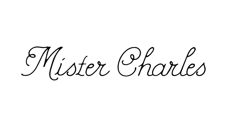 The image features the name "Mister Charles" written in black cursive font on a white background.