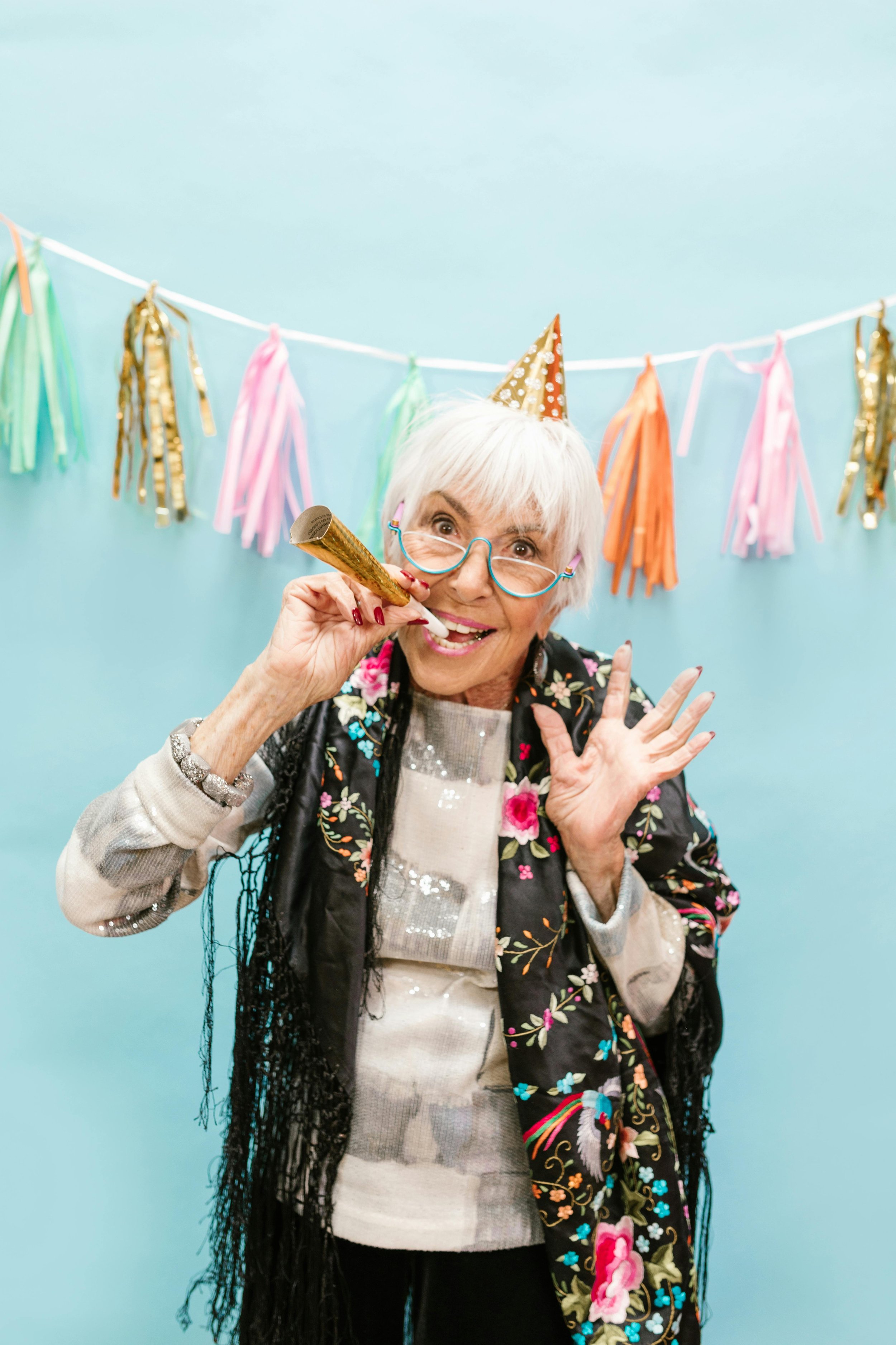 old lady celebrating with horn