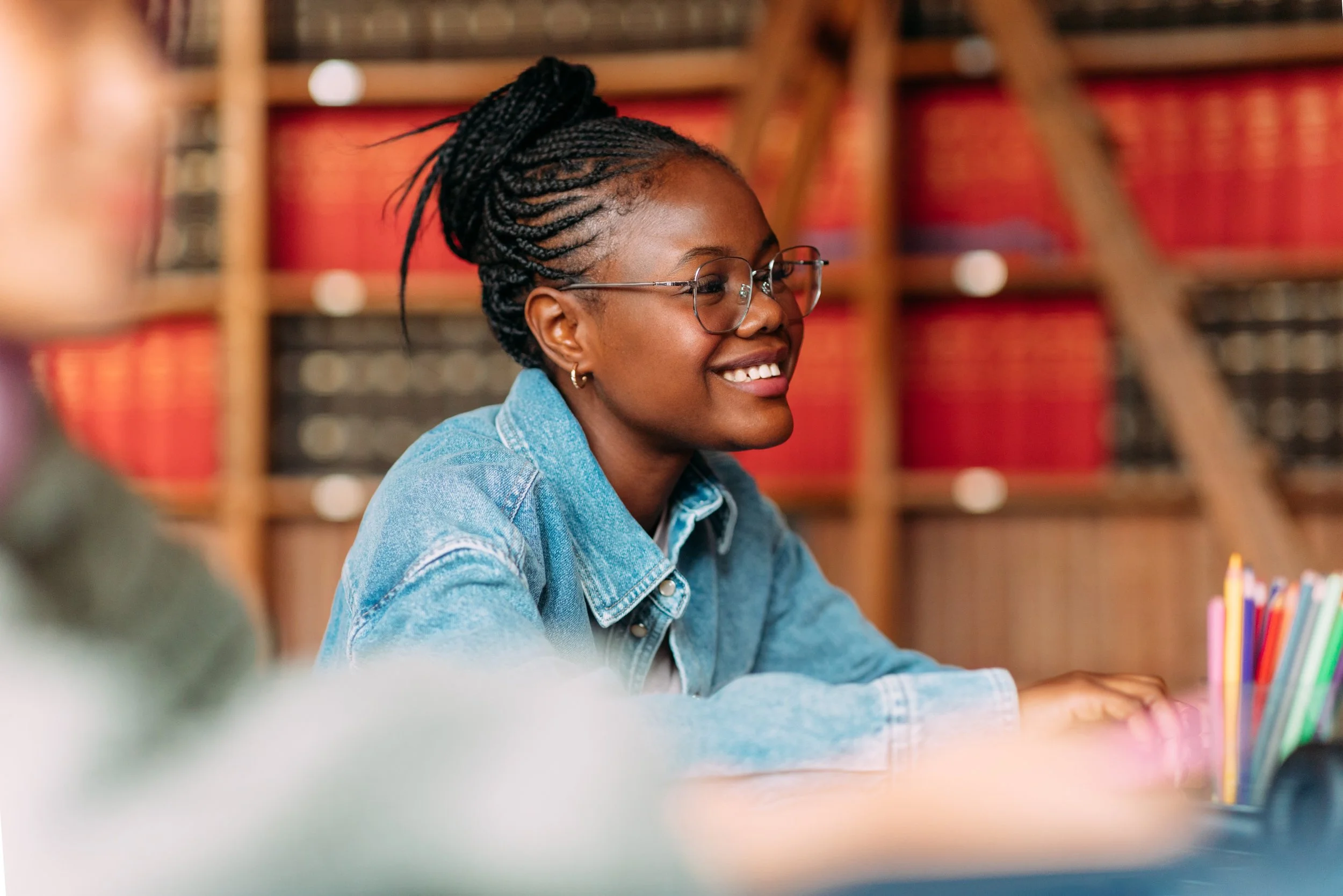 Student smiling during group test prep class.