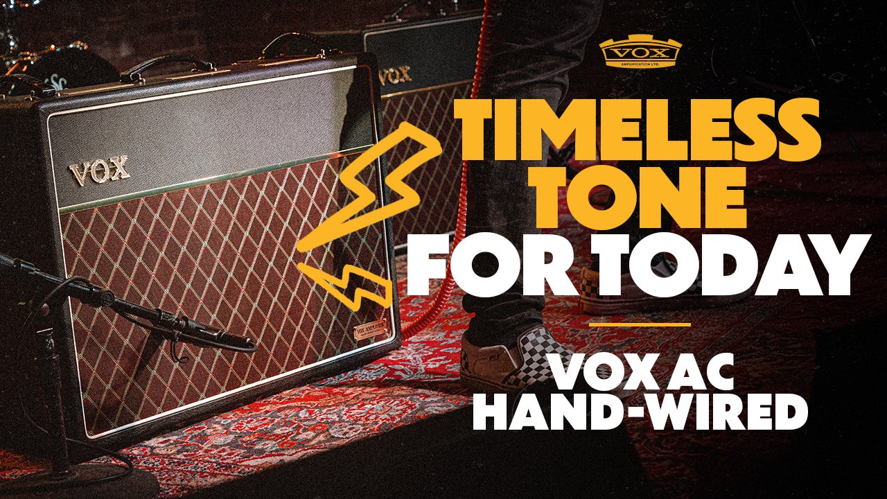 Vox AC hand-wired guitar amplifier on a patterned rug, with part of a person's leg and shoe visible, and a graphic with a lightning bolt icon and bold text that reads 'Timeless Tone for Today'.