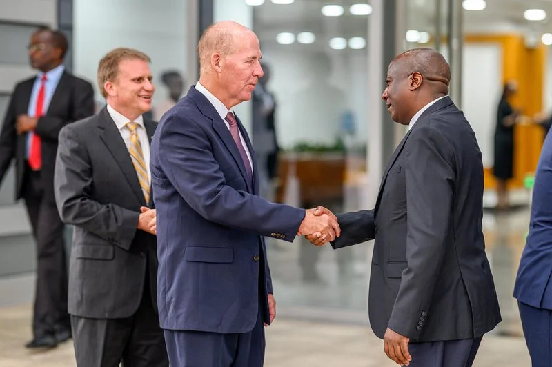 Sean Kerrigan of World Vision and I are congratulated by the Prime Minister of Rwanda, Edouard Ngirente, for fulfilling our commitment to finish the job in Rwanda.