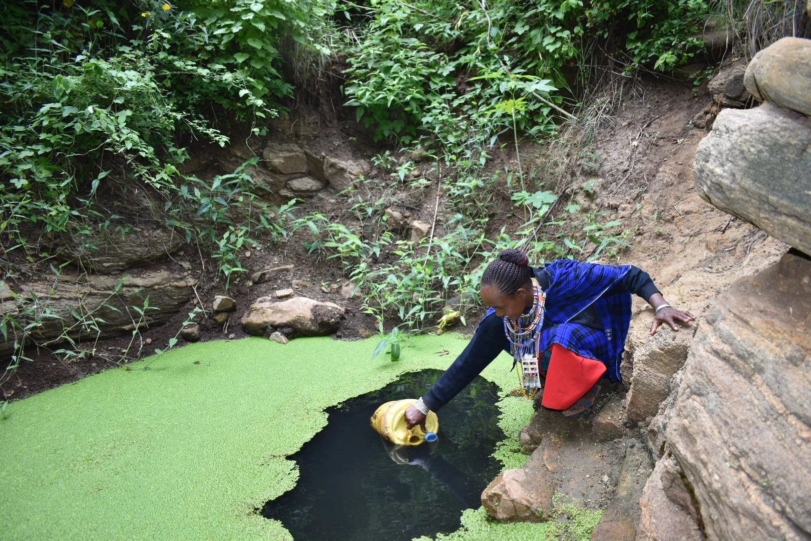 Naomi Nakokai's water source, where people drowned before World Vision provided a permanent water point near her home.