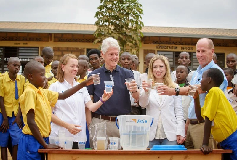 Hosting President Clinton and Chelsea in Rwanda with my P&G successor, Allison Tummon-Kamphuis.
