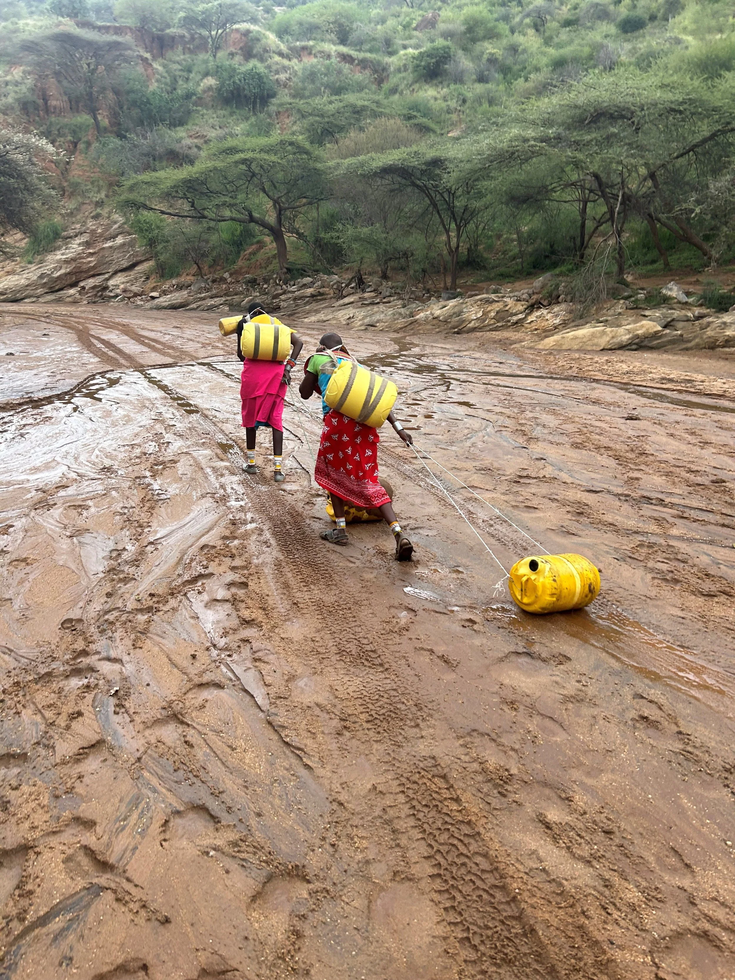Women hauling water
