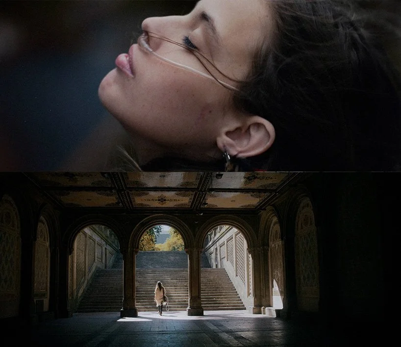 Close-up of a woman with an oxygen tube in her nose, lying down with her eyes closed, and a person walking down the stairs of an ornate outdoor staircase.