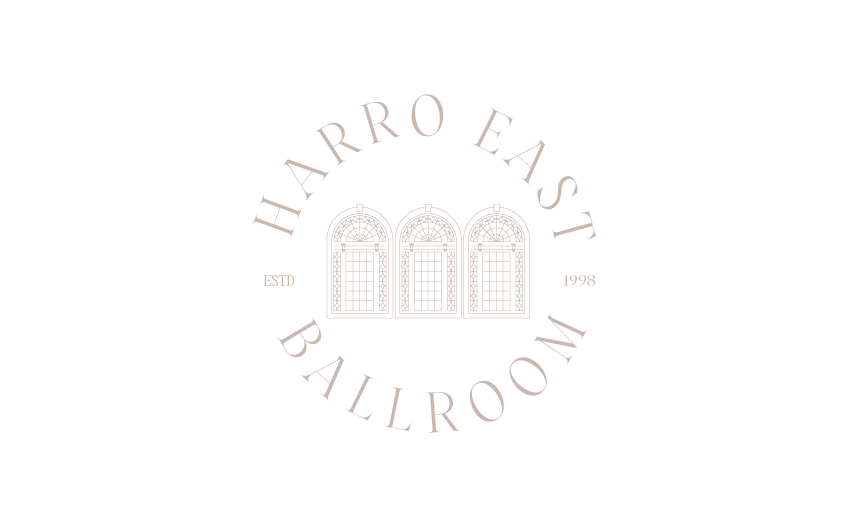 Logo for Harro East Ballroom featuring three arched windows with decorative detailing, with text "Harro East Ballroom" around the top and "Ballroom" at the bottom, and smaller text "ESTD 1998" on each side.