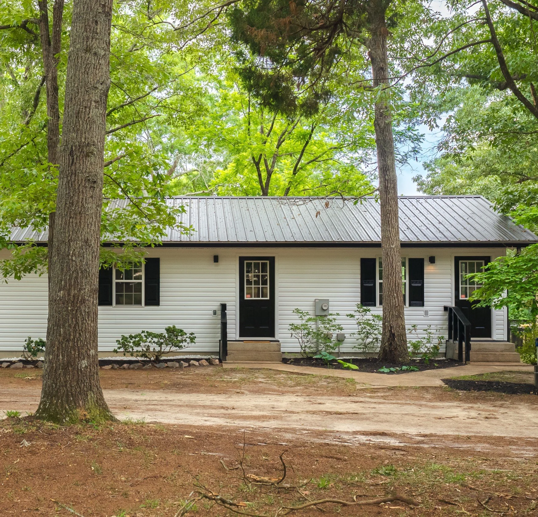 Nestled between the trees and the pastures.