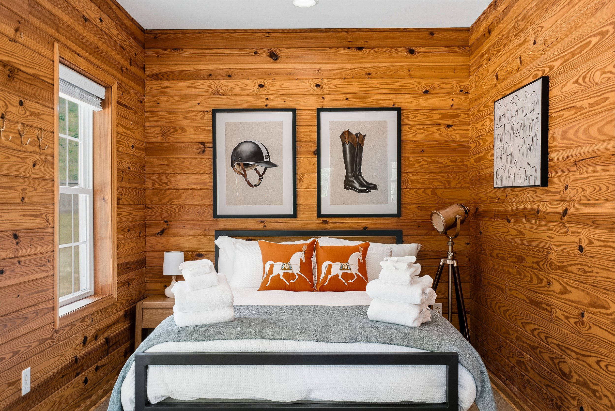 Cozy and comfortable queen bed with pasture views.