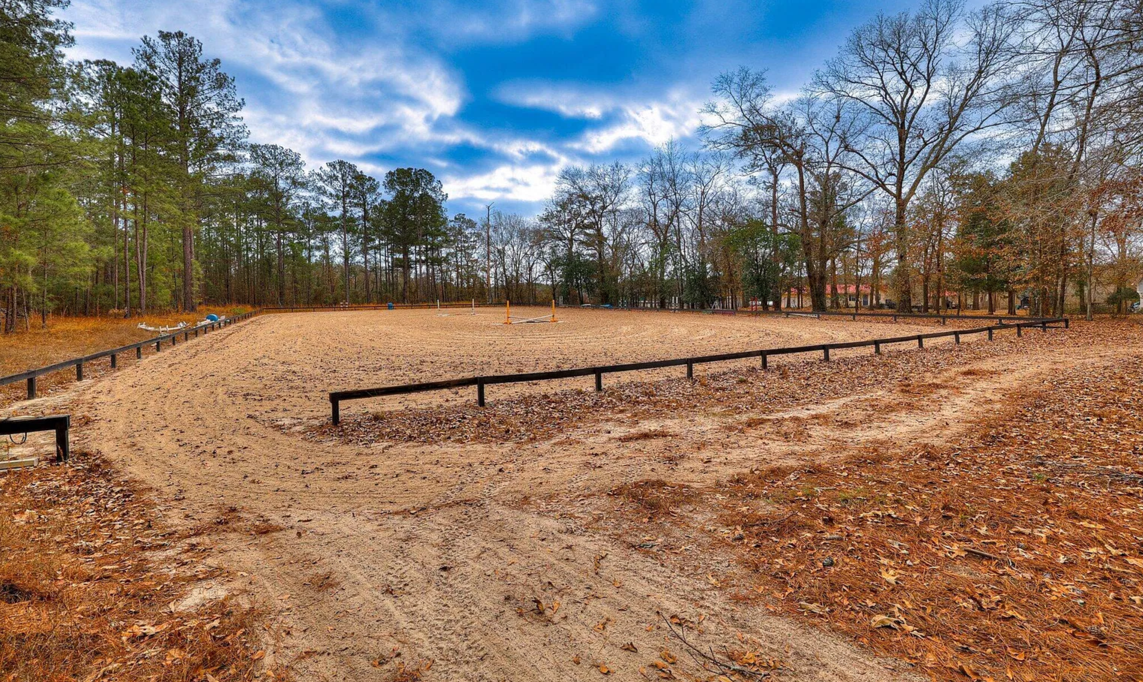 120 x 220 sand arena with jumps (not pictured) and viewing platform