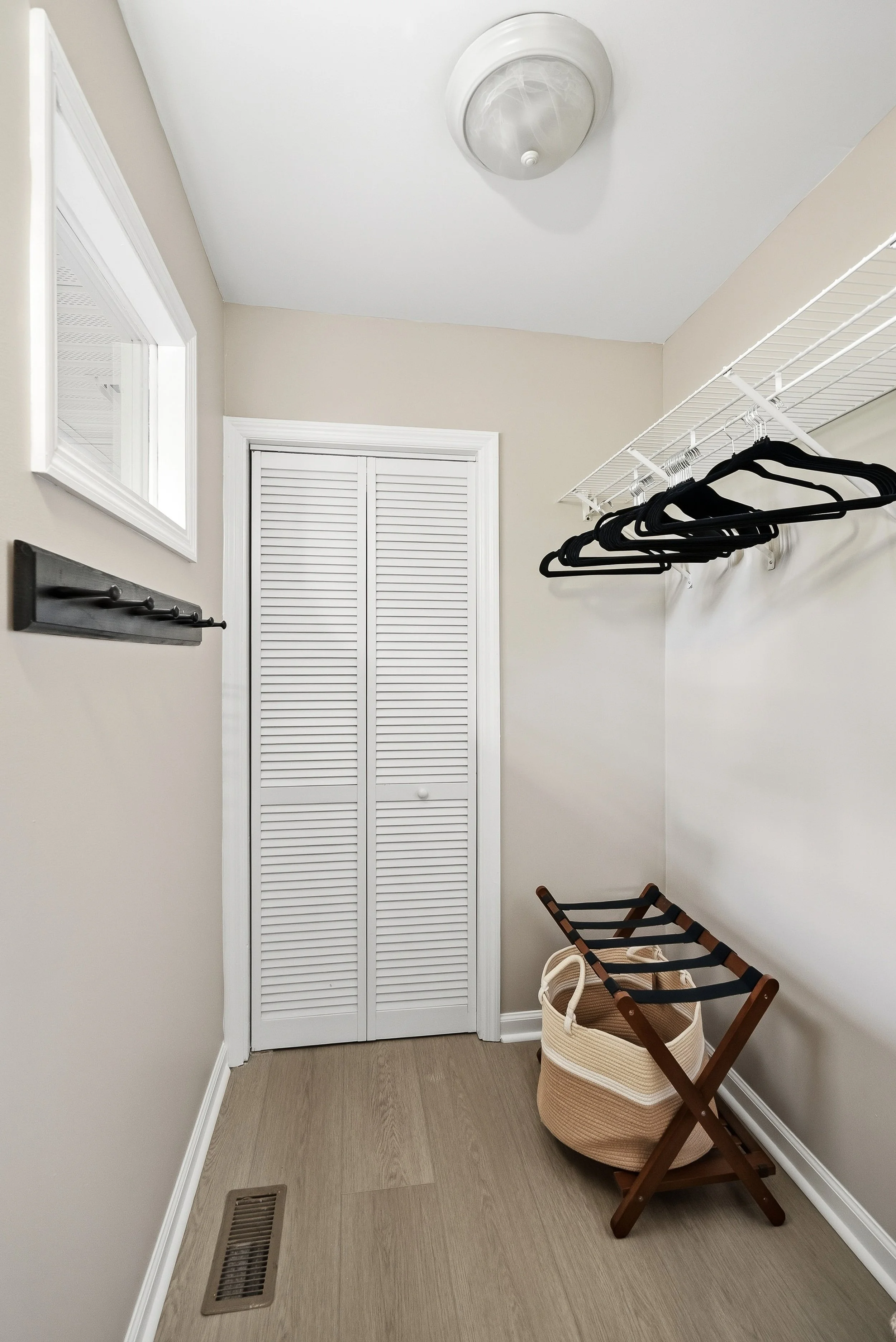 Full walk-in closet adjacent to the bedroom with plenty of room for all your things.