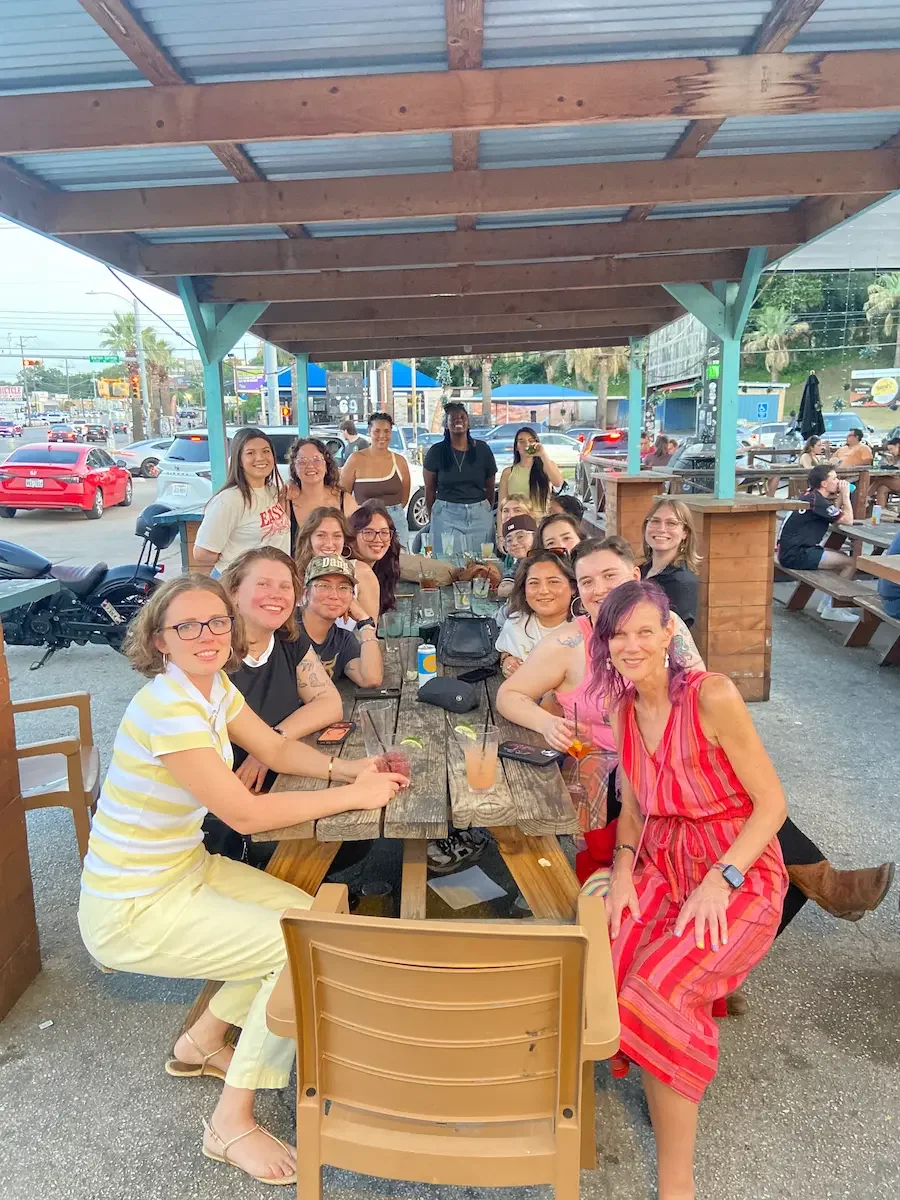 Lesbians having drinks in Austin Texas at an event held by Sapphic Weekly ATX