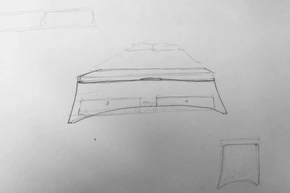A sketch of a wooden chest at the end of a double bed with two pillows - furniture design drawing by Henry Crabb