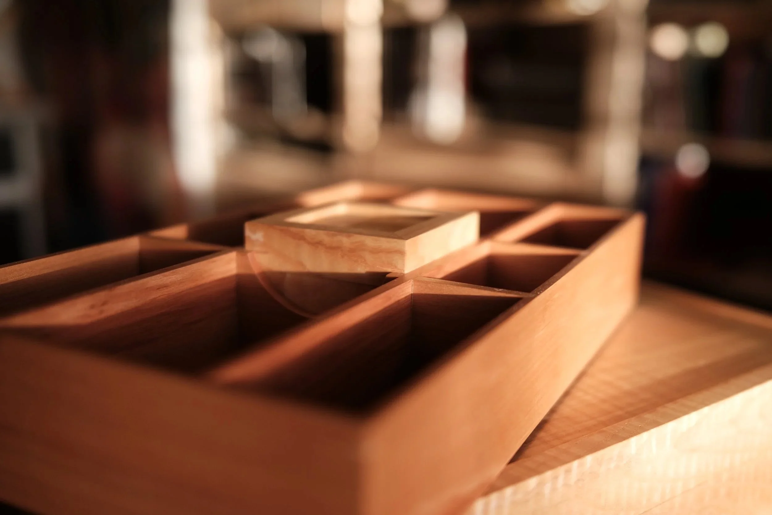 Open nested tray from the Engagement Box — English pear wood compartments housing a small ring box, hand-made by Henry Crabb in West Cornwall