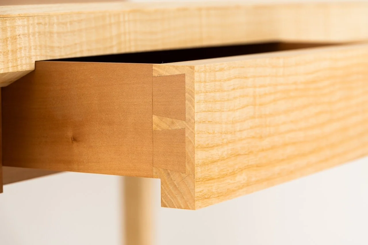 Journal Desk drawer — hand-cut dovetail joint in rippled ash with cedar of Lebanon base, fine furniture making by Henry Crabb