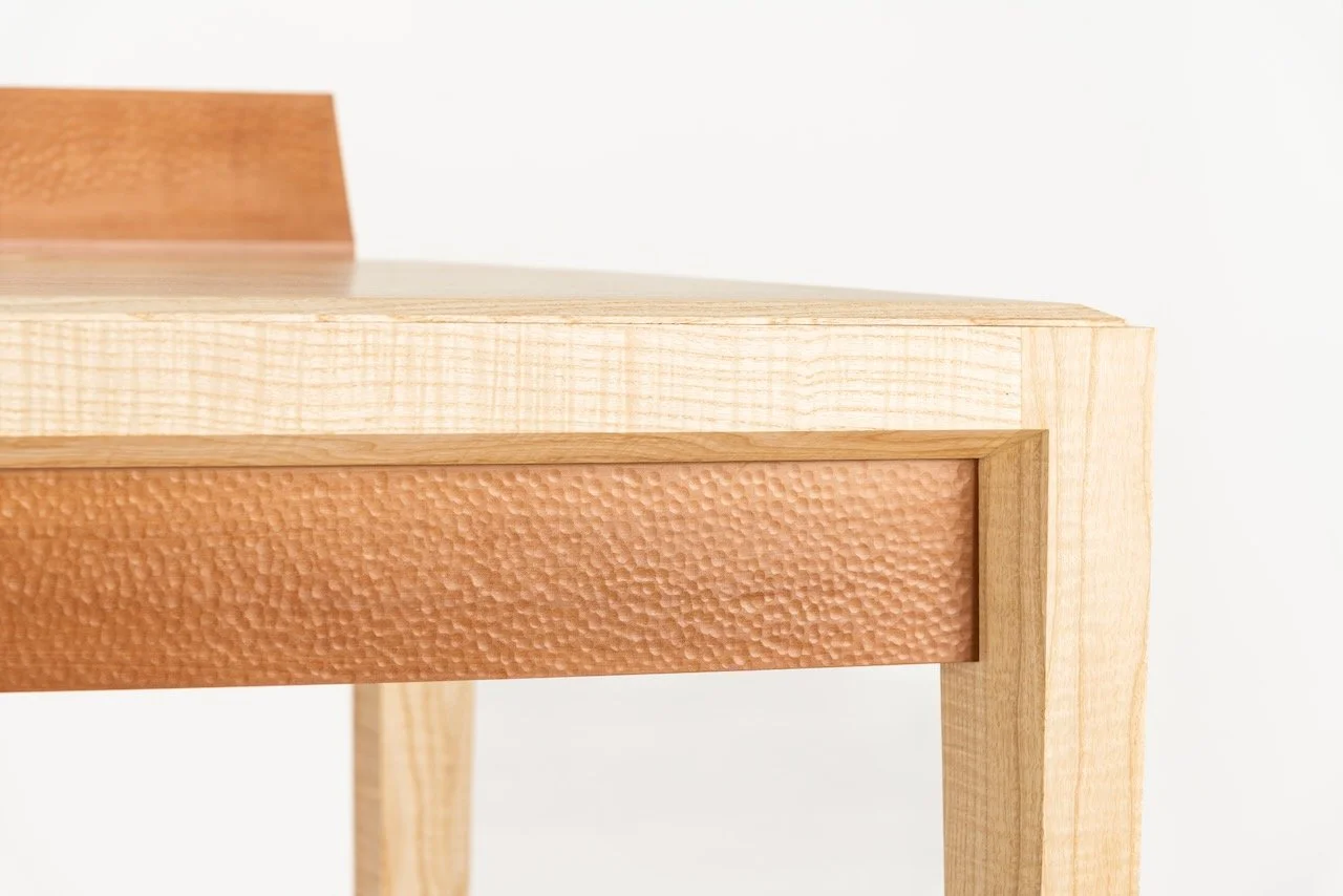 Journal Desk joinery detail — rippled ash leg and rail with hand-textured Swiss pear panel inset, by Henry Crabb