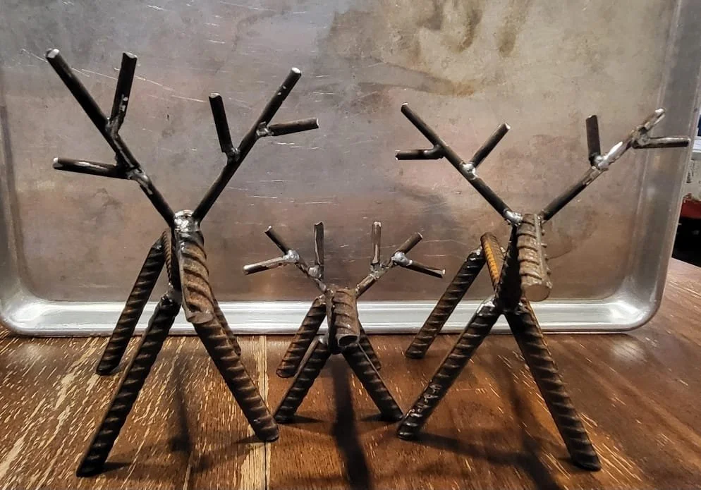 Rebar deer sculpture made from steel rebar for yard decor and rustic outdoor decoration.