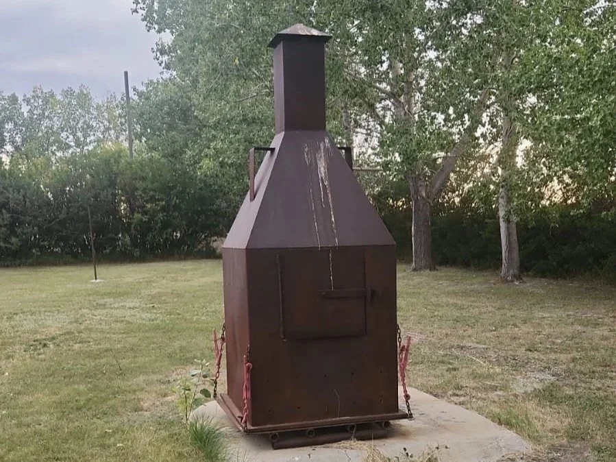 Custom built steel incinerator designed for safe waste burning.
