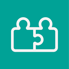 Two puzzle pieces connecting, symbolizing teamwork or collaboration.