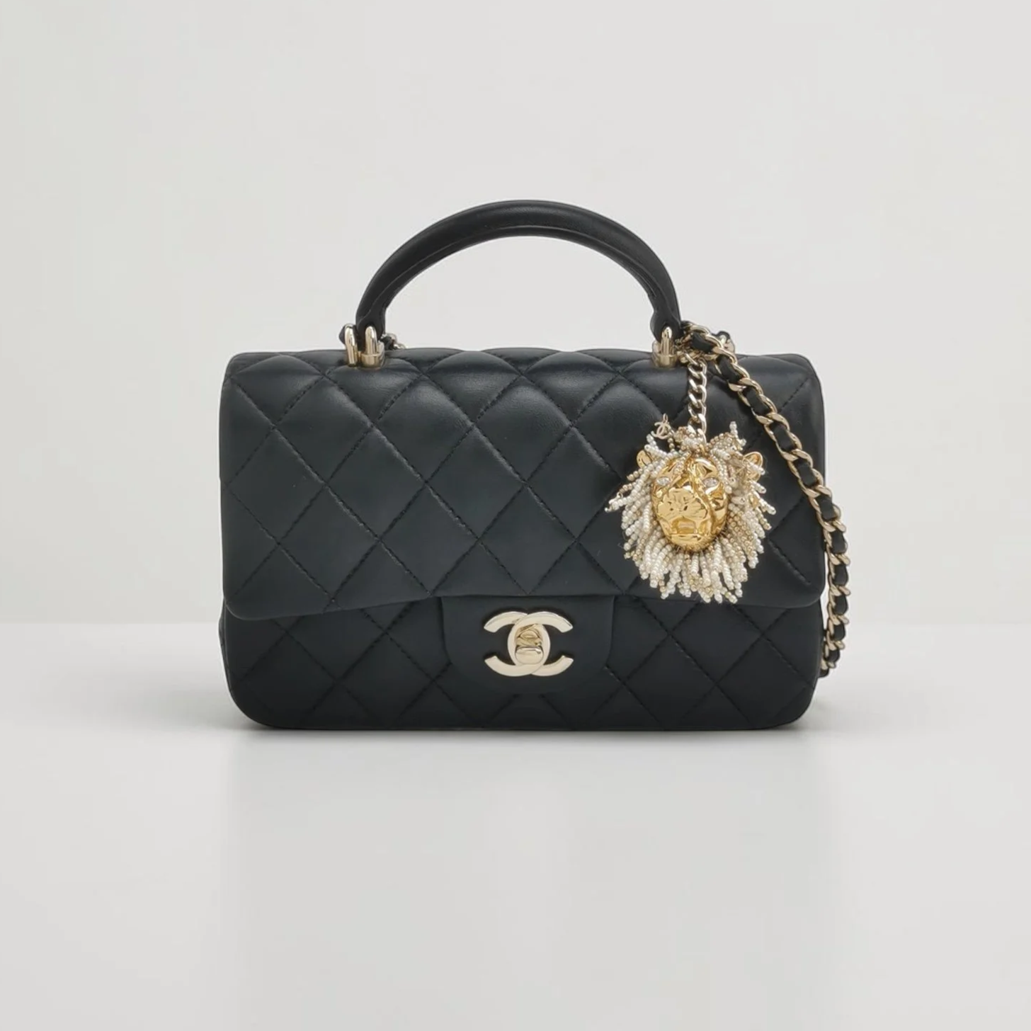 Chanel Mini Top Handle Flap with Lion Charm