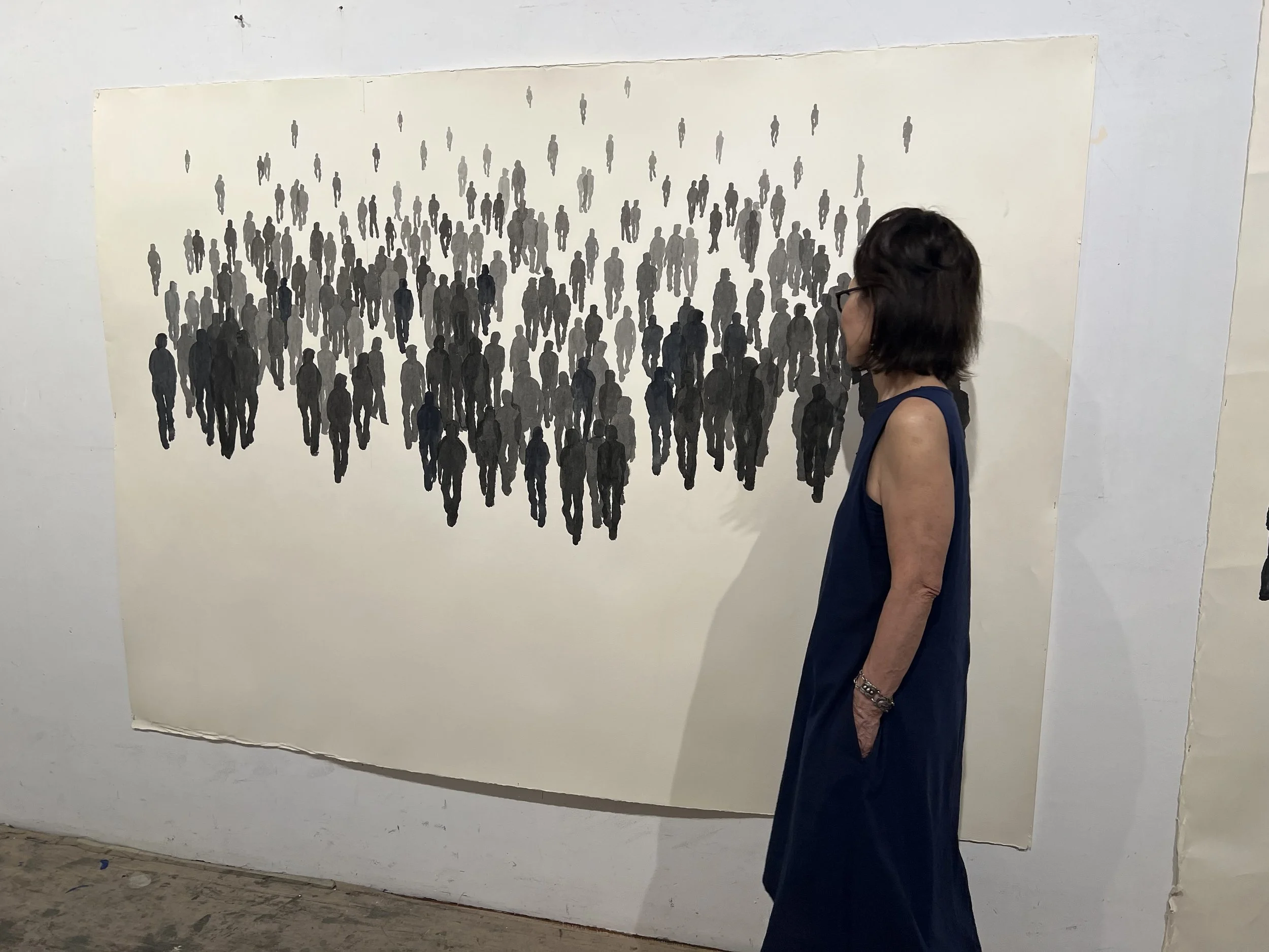 3. Artist standing next to it.jpeg