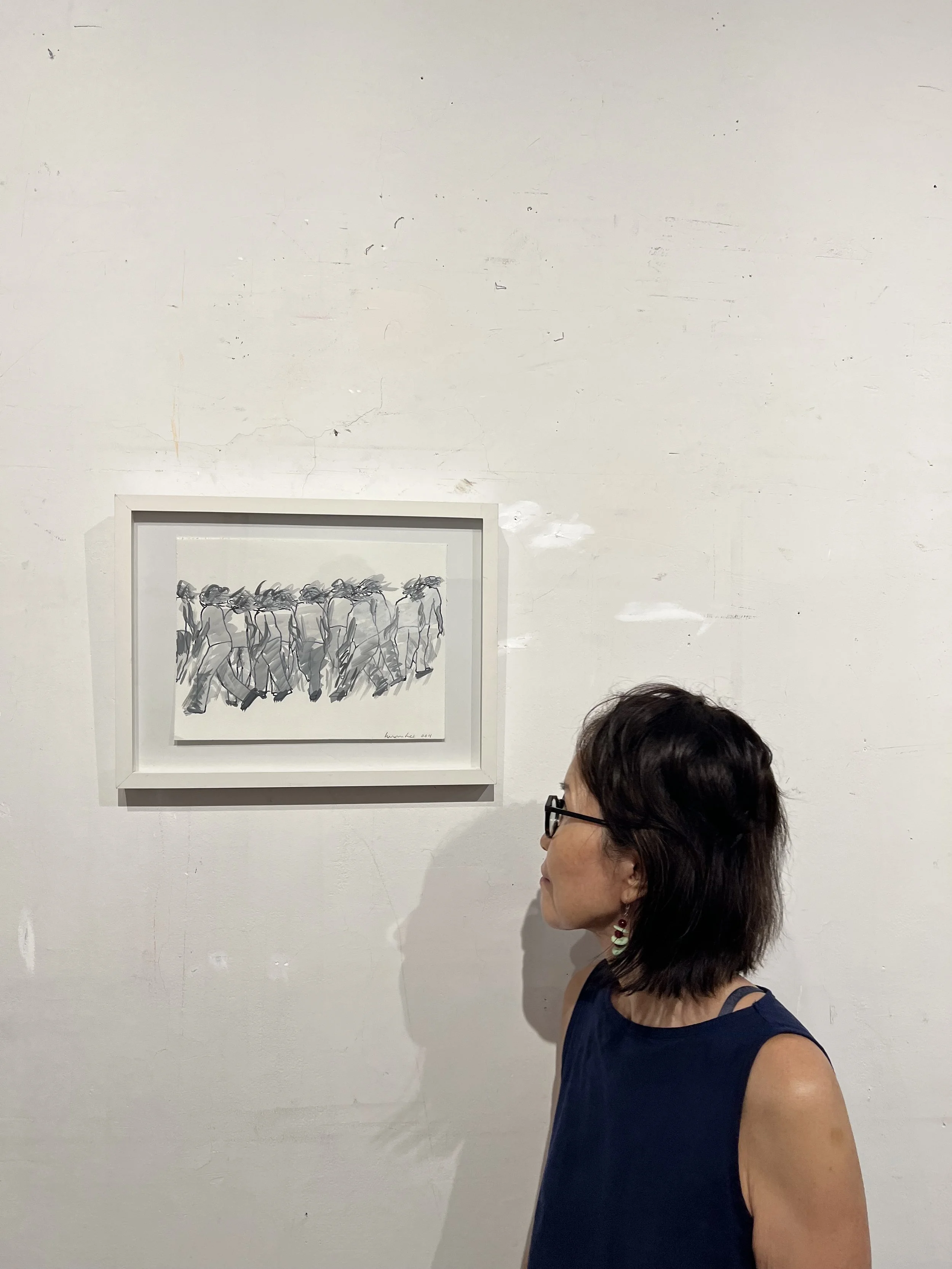 1. Artist standing next to it.jpeg