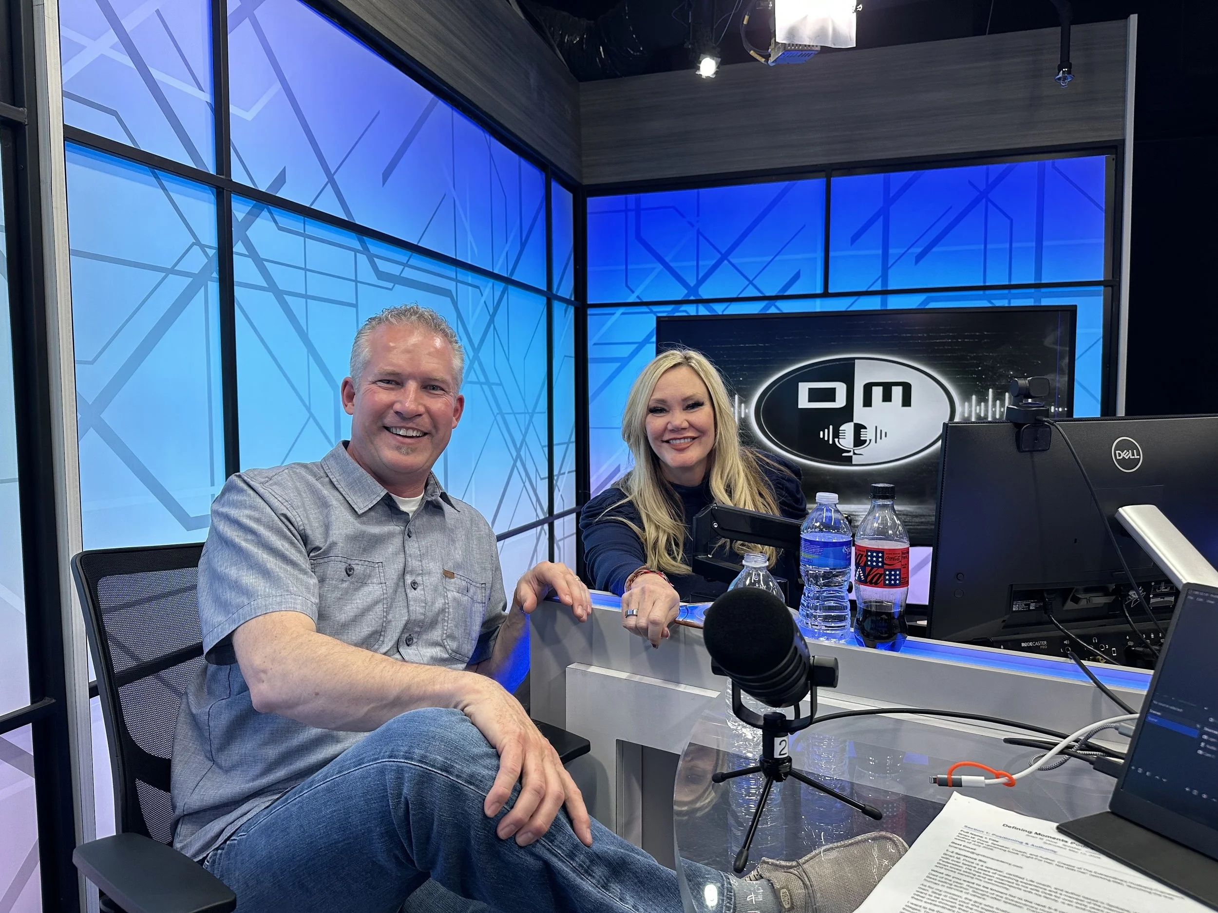 brian speaking on podcast in a studio