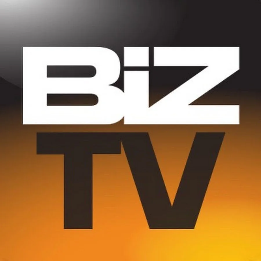 Logo of BIZ TV with black, white, and orange background.