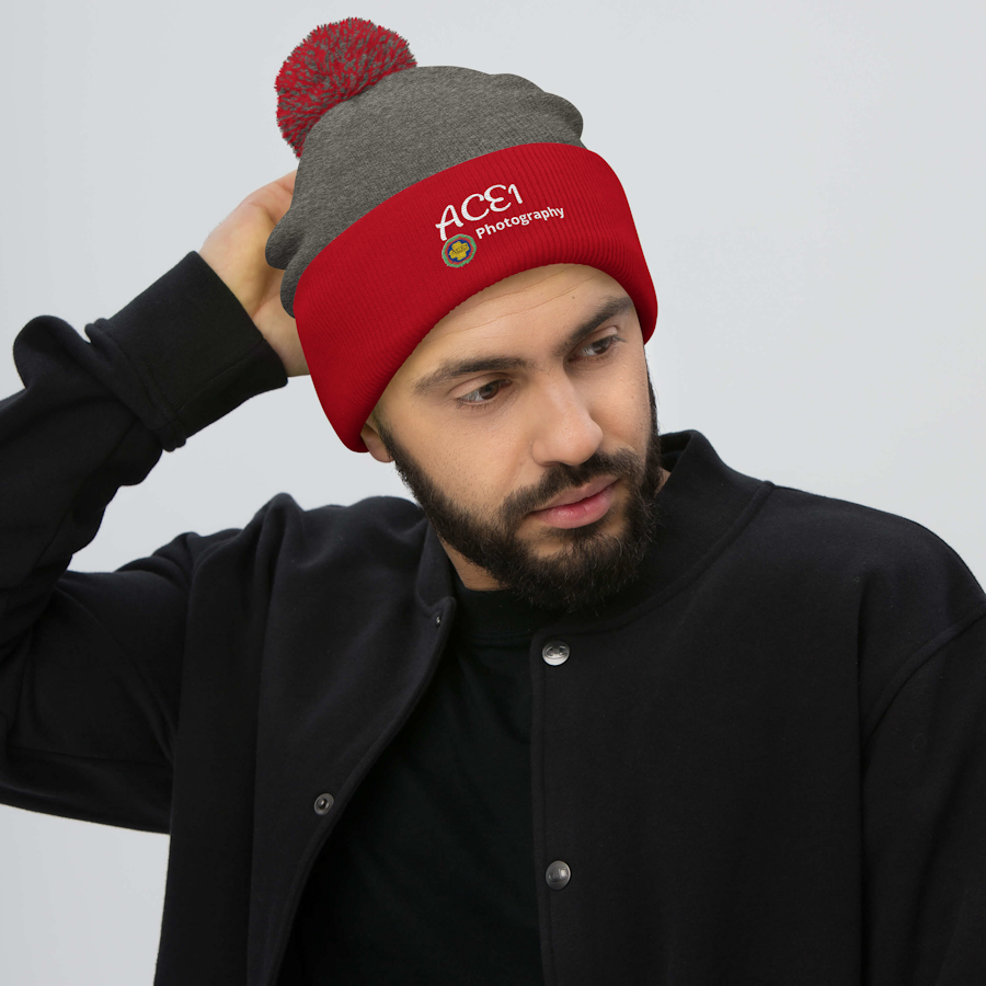 pom-pom-knit-cap-dark-heather-grey-red-front-69f2aa9941194.png