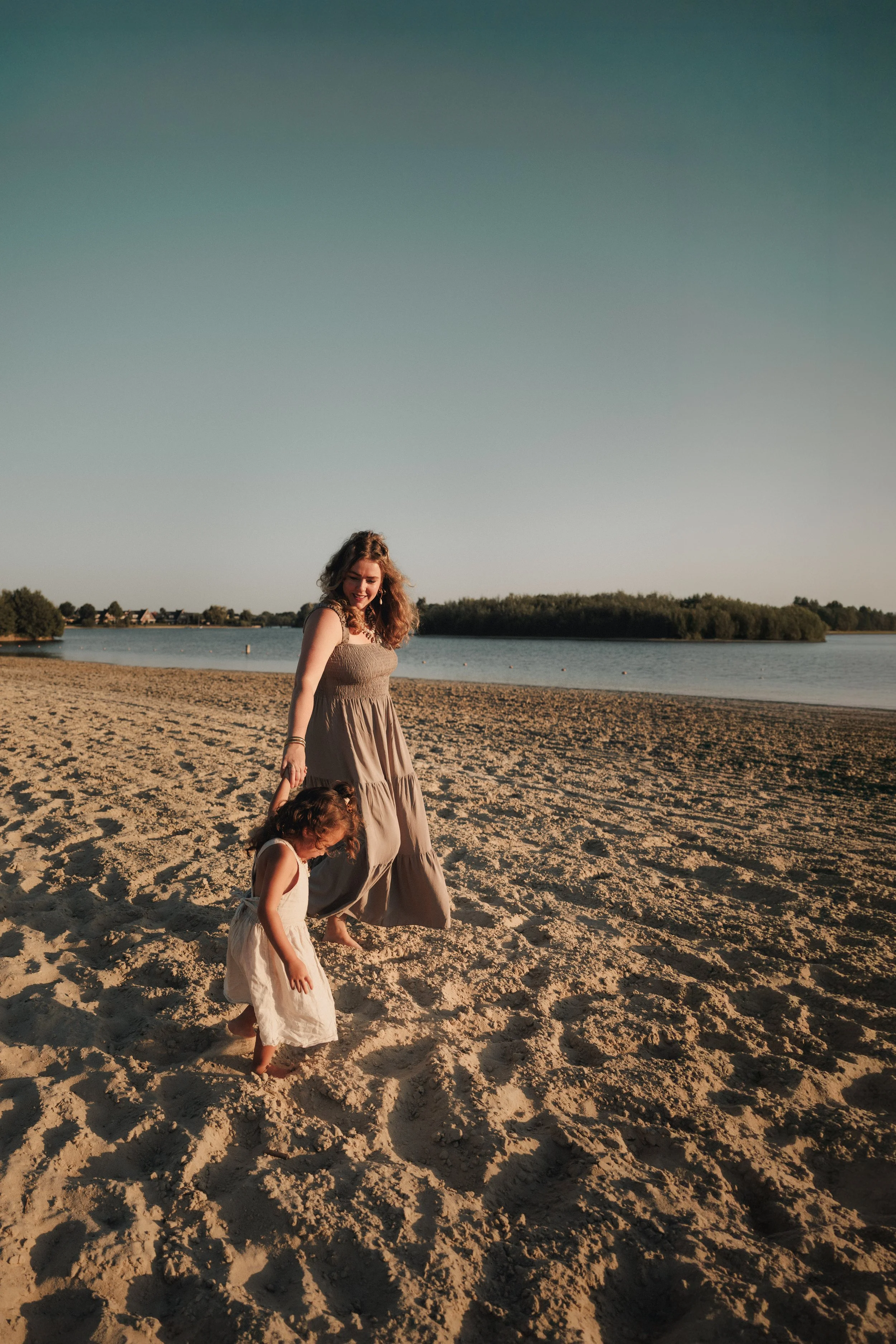 Mom and daughter in the sun for mommy and me photography