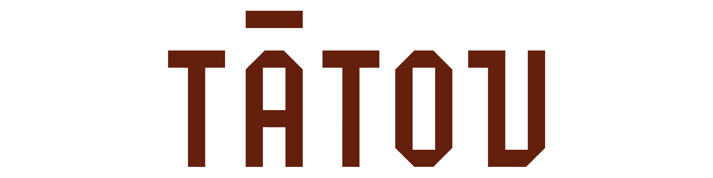 The word 'TÁTOU' in large, bold, brown letters on a black background.