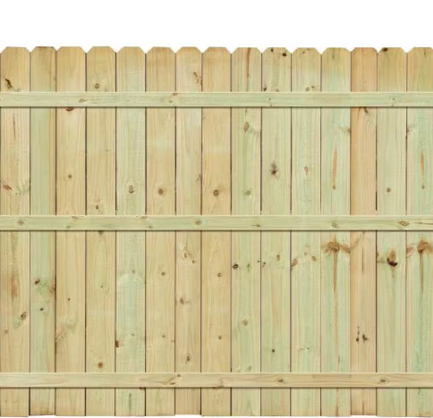 Close-up of a light-colored wooden privacy fence with vertical planks and horizontal support beams.
