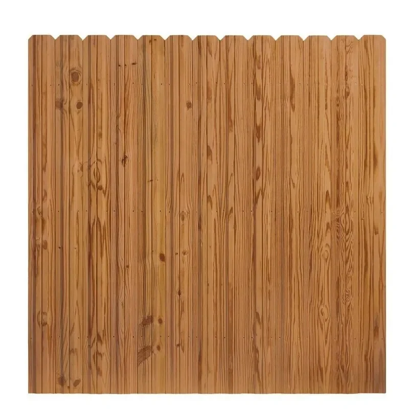 A wooden privacy fence with vertical slats in a natural wood finish.