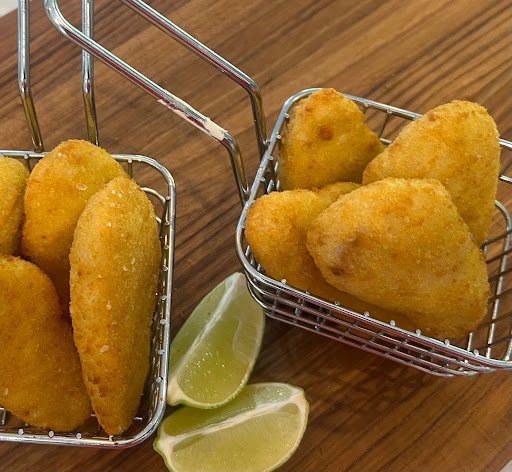 Panko crumbed chicken tenders with potato wedges