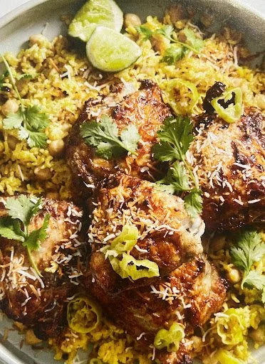 Spiced yogurt chicken with cardamom coconut pilaf