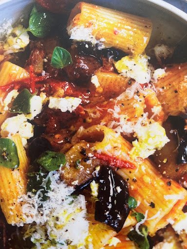 Pasta Norma (rigatoni in a tomato eggplant sauce topped with ricotta salata)