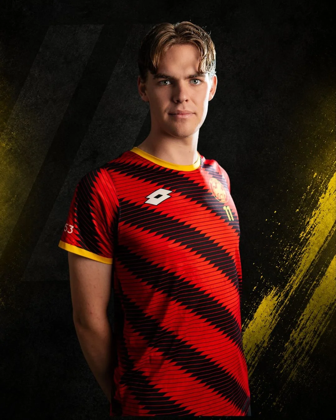 Charlie davidson, youth football coach at Ellerslie Performance Hub, wearing a red and black football jersey.