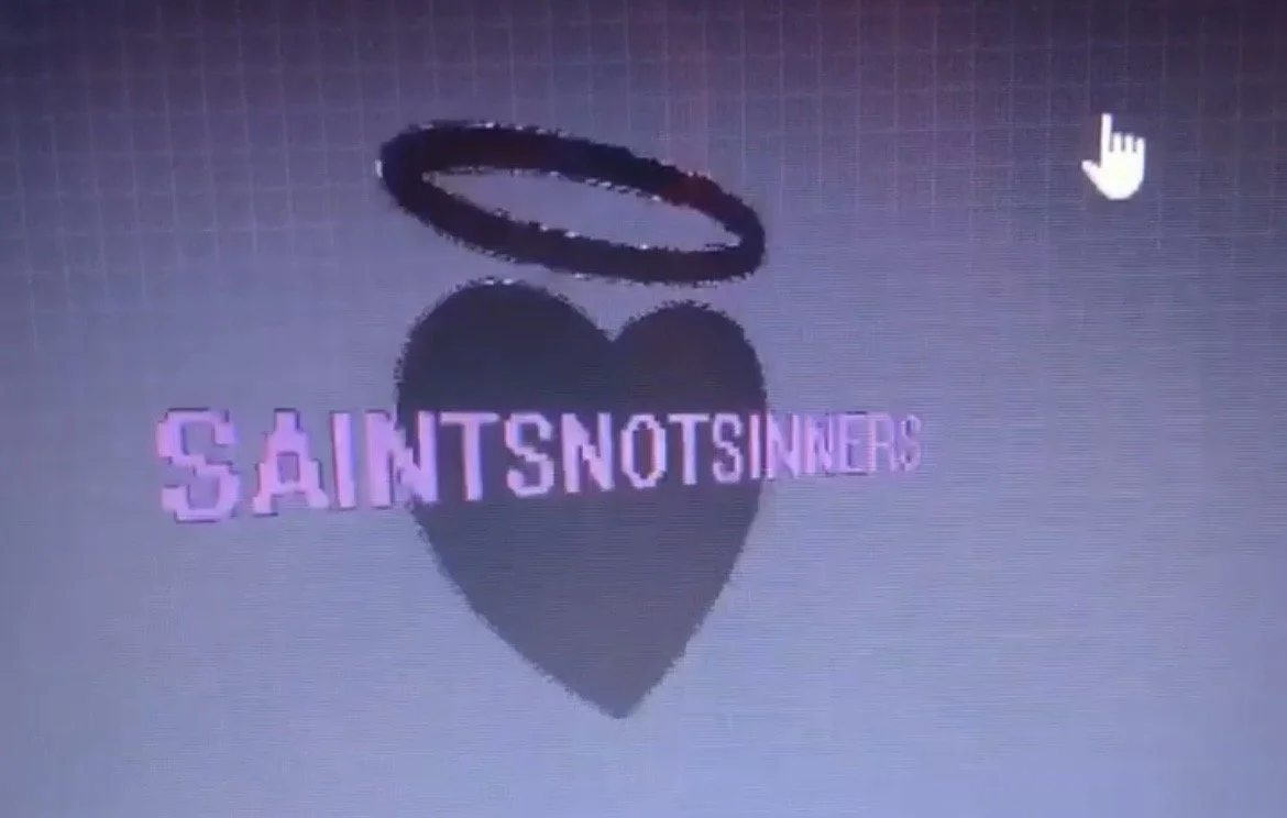 A black heart with the words 'SAINTS NOT SINNERS' in purple text across it, with a black halo above the heart on a gray background.