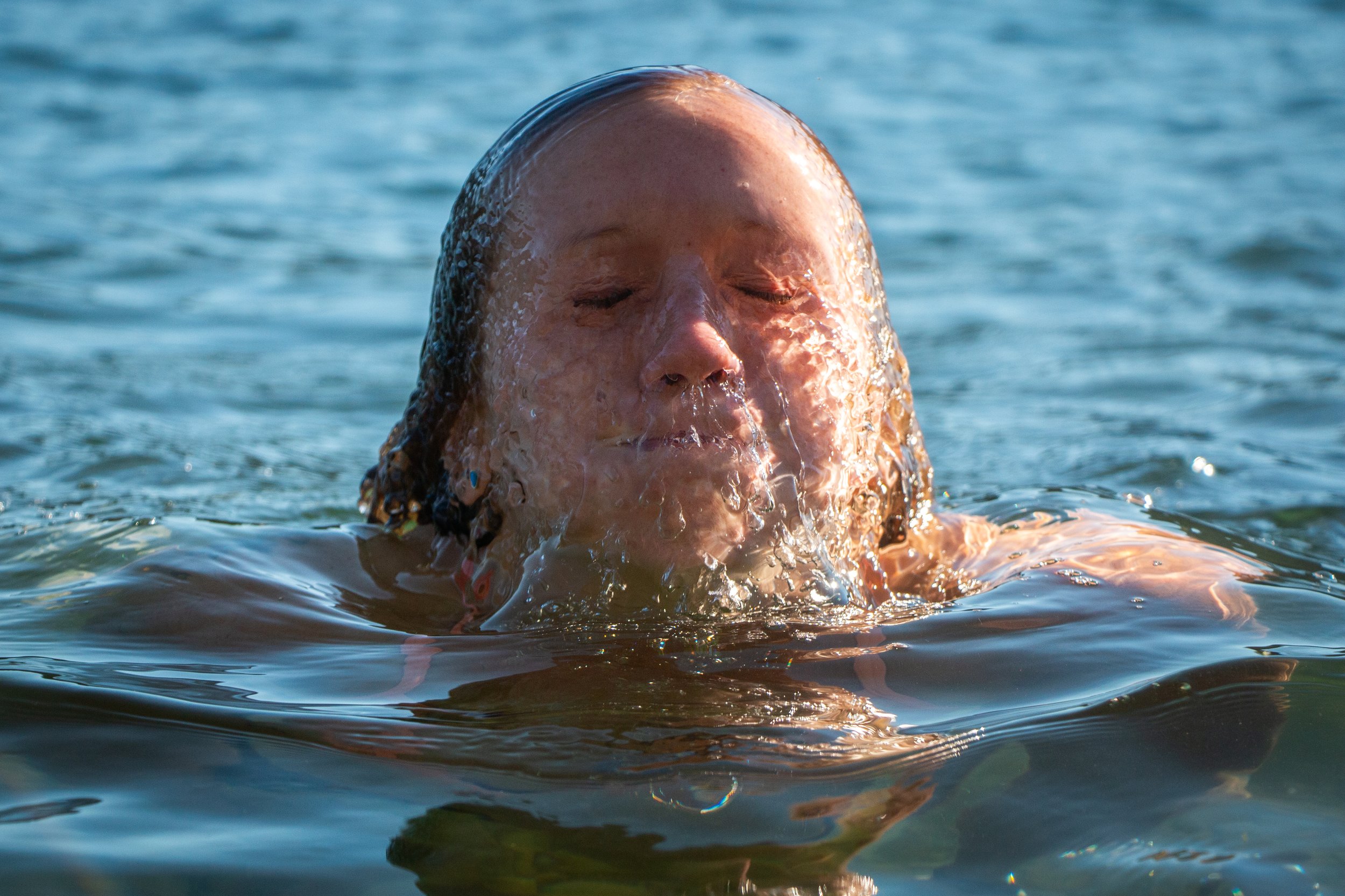 Jessica Bailey emerges from Coeur d'Alene Lake in northern Idaho.