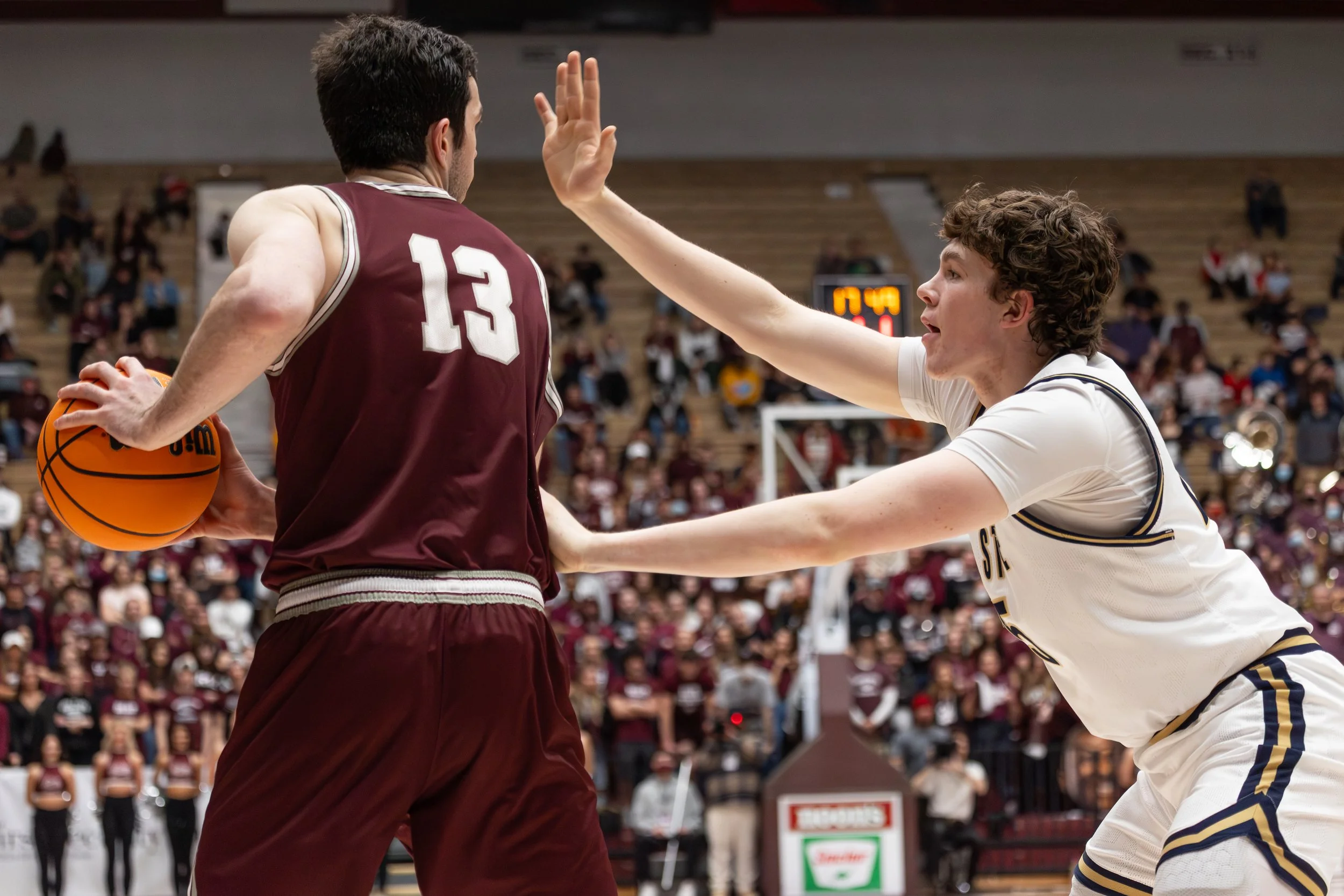 Montana State's Sam Lecholat, right, plays defense against rival Montana's Josh Bannan, left, during their game at Dahlberg Arena on February 27, 2022 in Missoula, Mont.