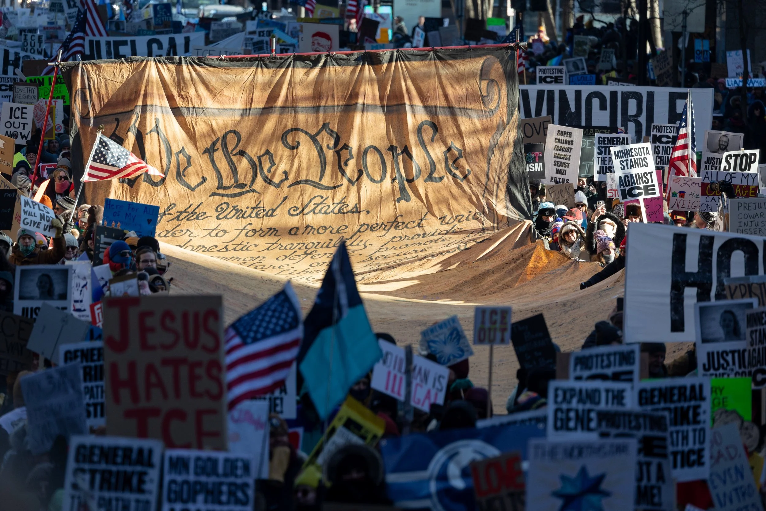 Marchers in downtown Minneapolis carry a large depiction of the U.S. Constitution during a protest on January 30, 2026 against ICE operations in the city.