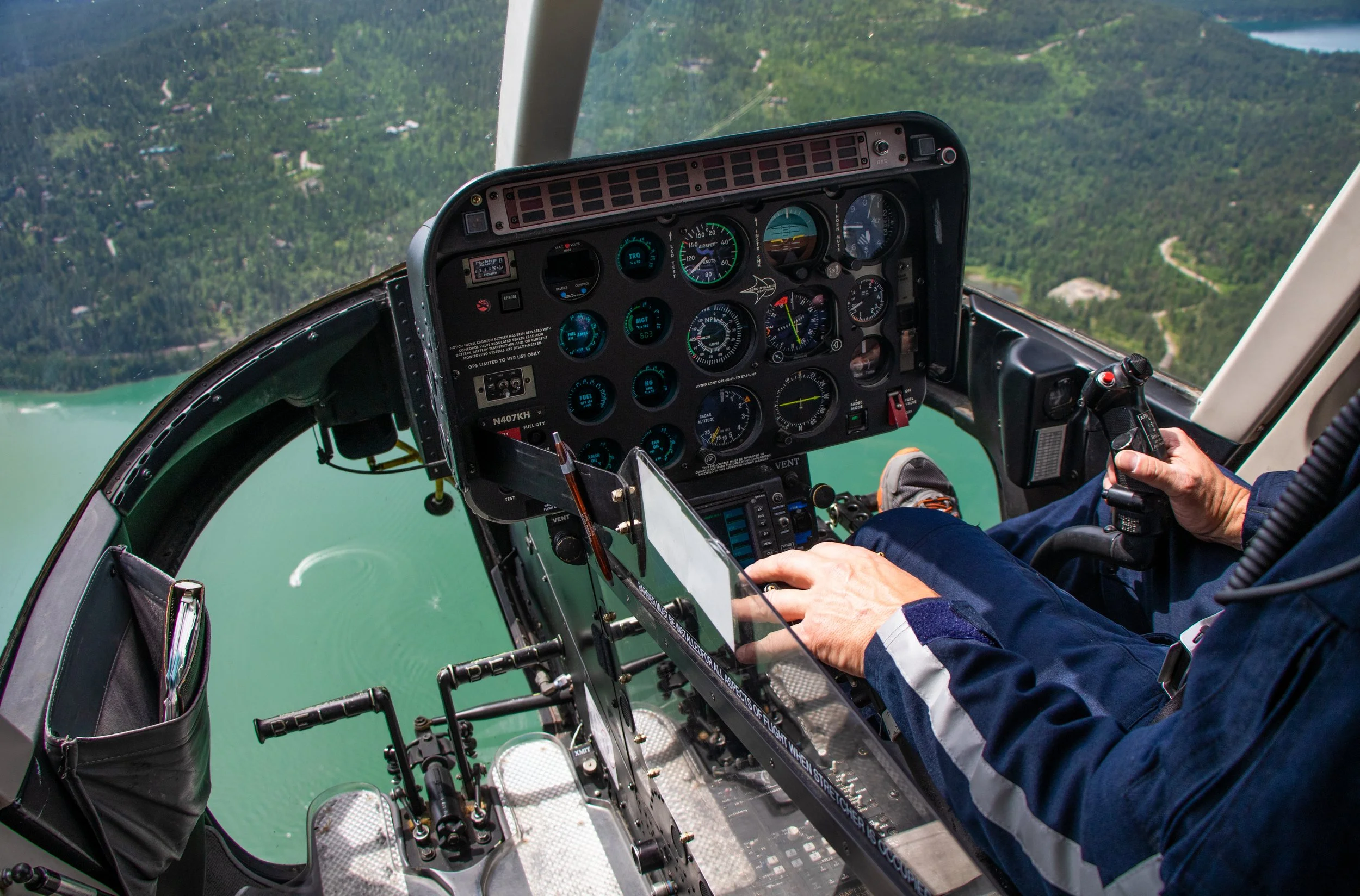 Logan Health Medical Center's Advanced Life-Support and Emergency Rescue Team (A.L.E.R.T.) helicopter, America's first rural air ambulance program formed in 1975 in Kalispell, Montana, flies over Whitefish Lake.