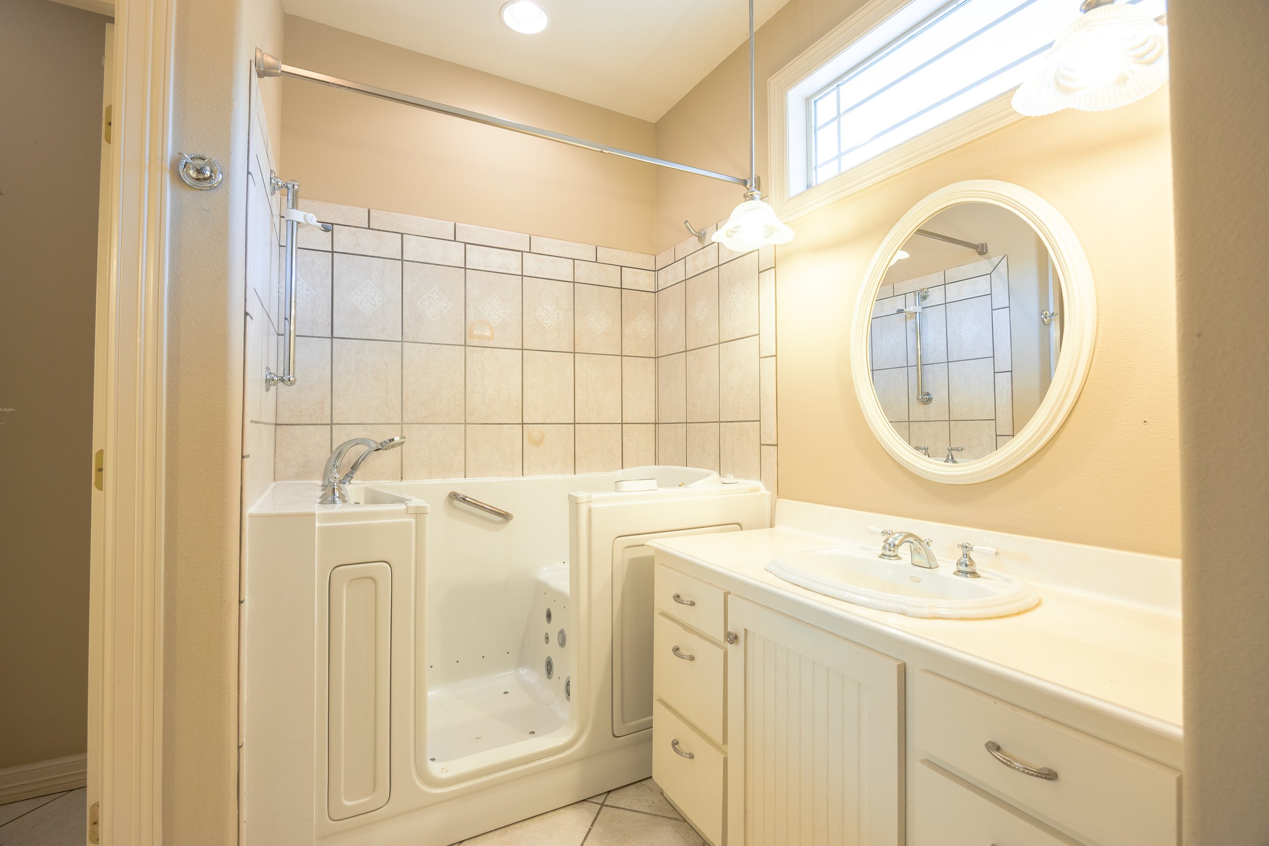 Four spacious bedrooms and three full baths, with three of the bedrooms thoughtfully placed on the primary level. 