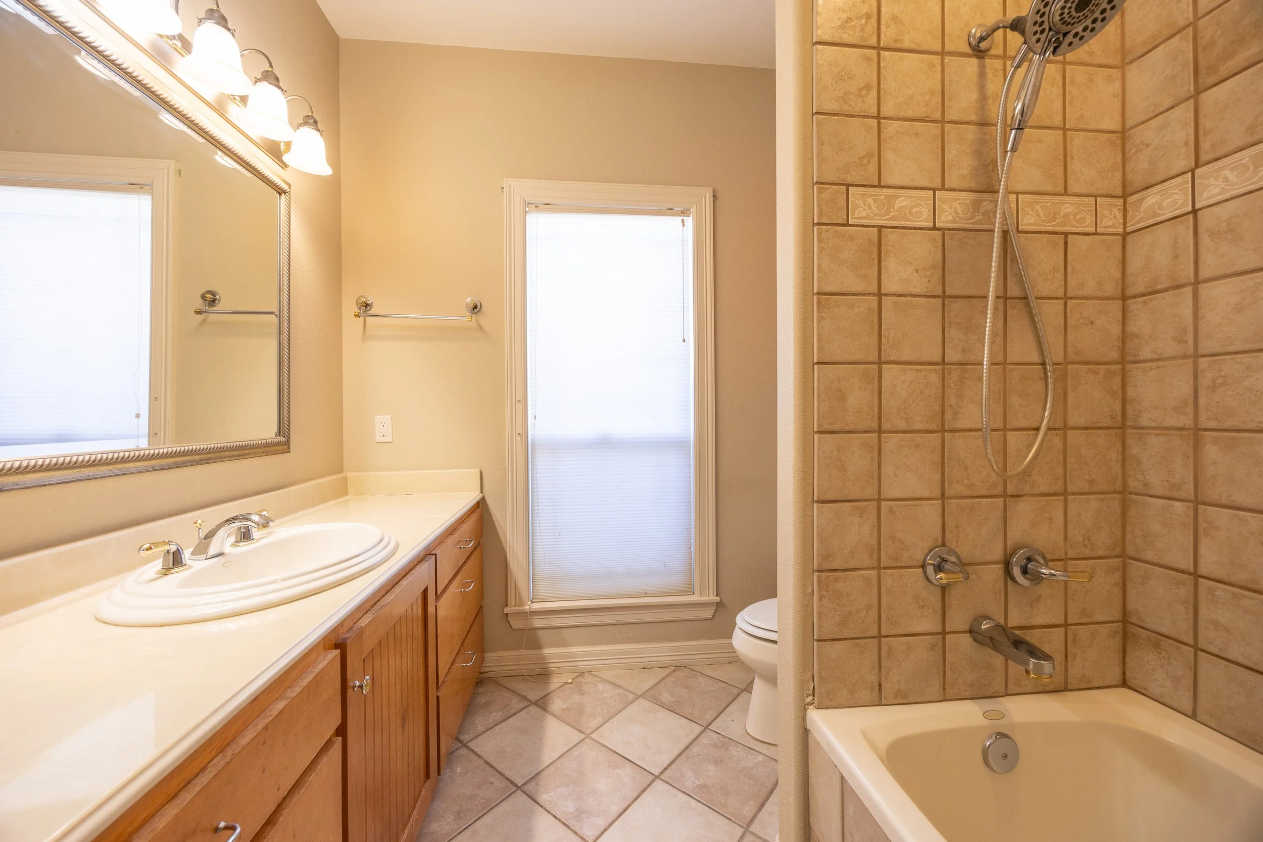 Four spacious bedrooms and three full baths, with three of the bedrooms thoughtfully placed on the primary level. 