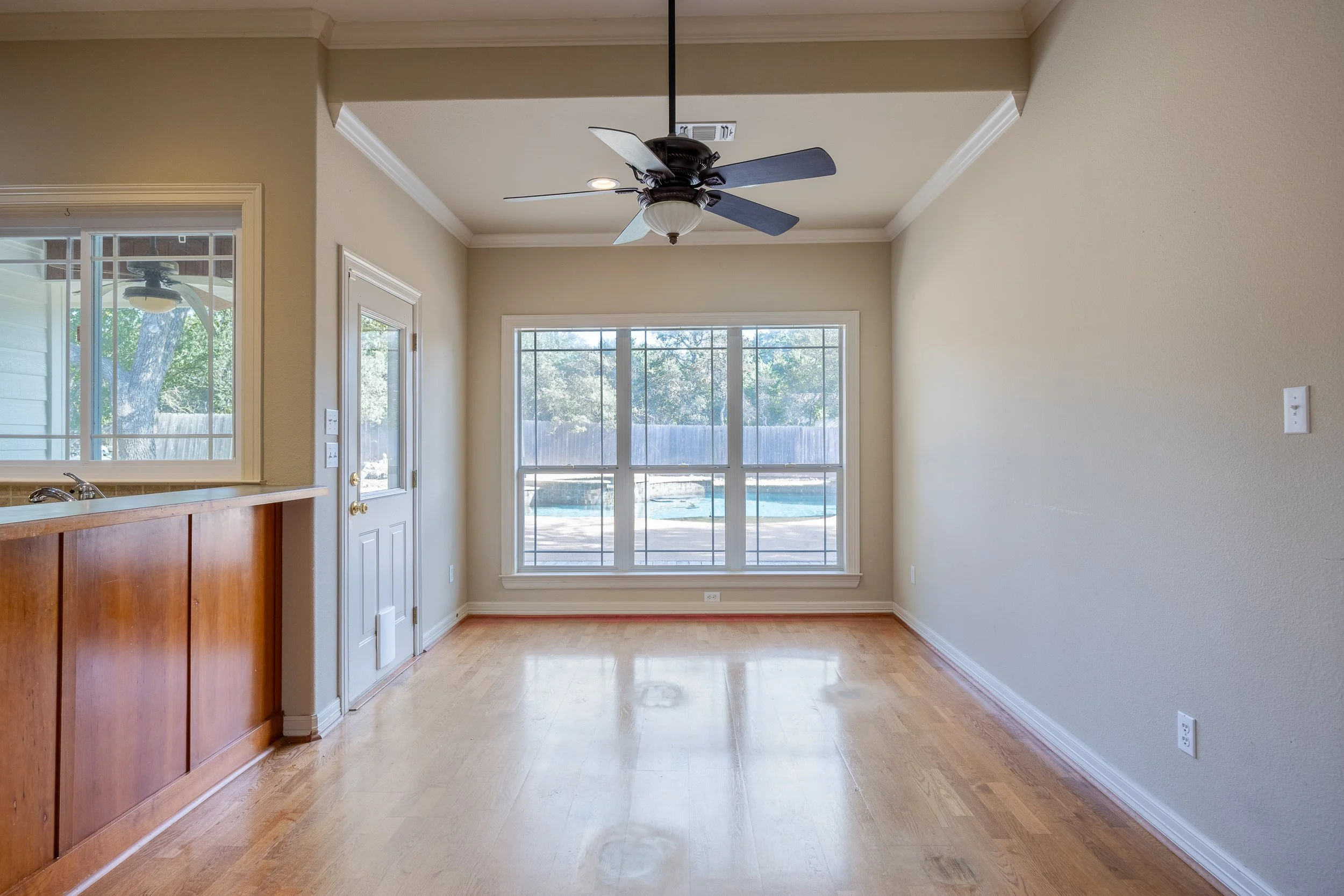 At the heart of the home, the modern kitchen features stainless steel appliances and an integrated water softener system.
