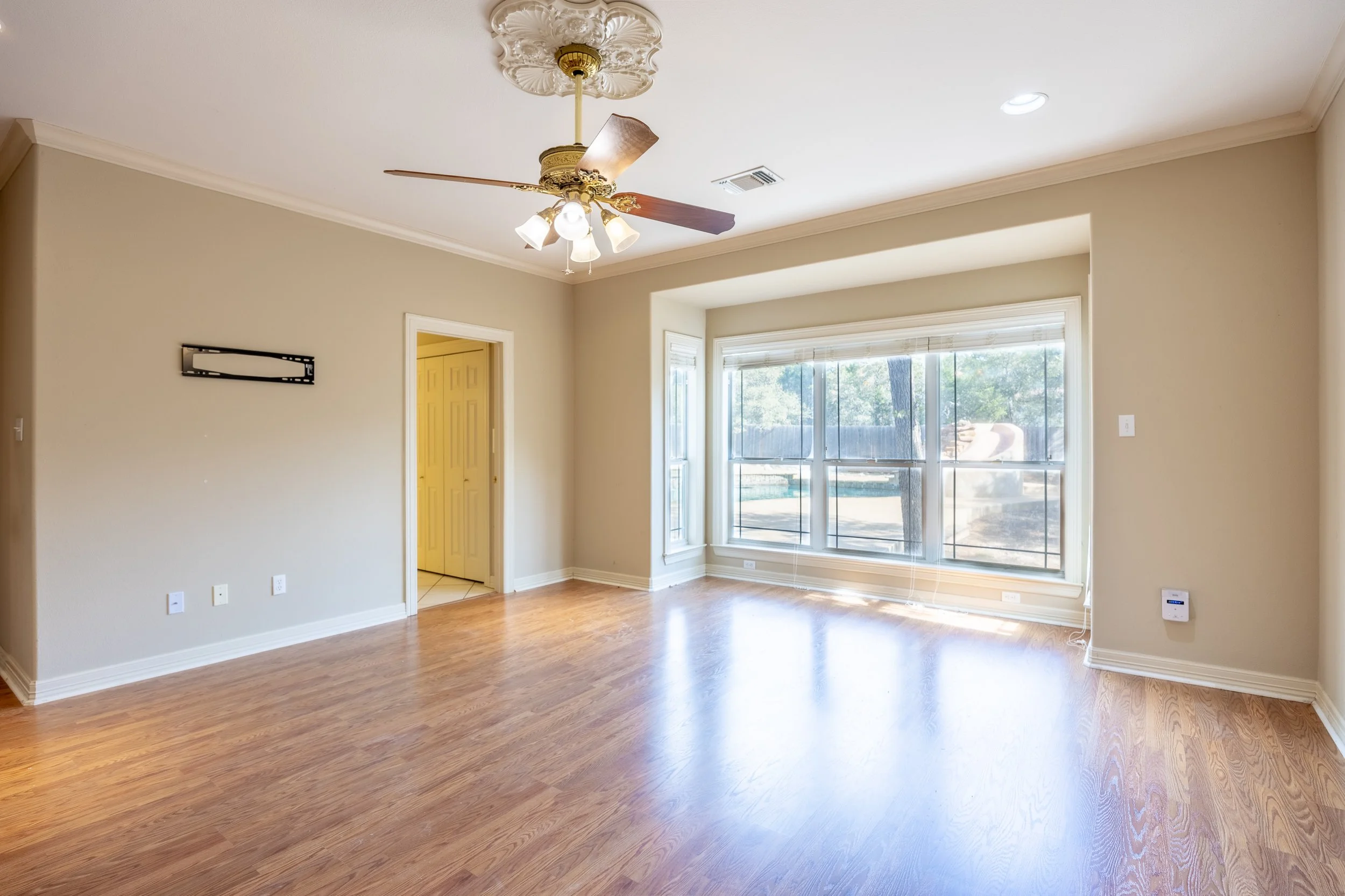 Four spacious bedrooms and three full baths, with three of the bedrooms thoughtfully placed on the primary level. 