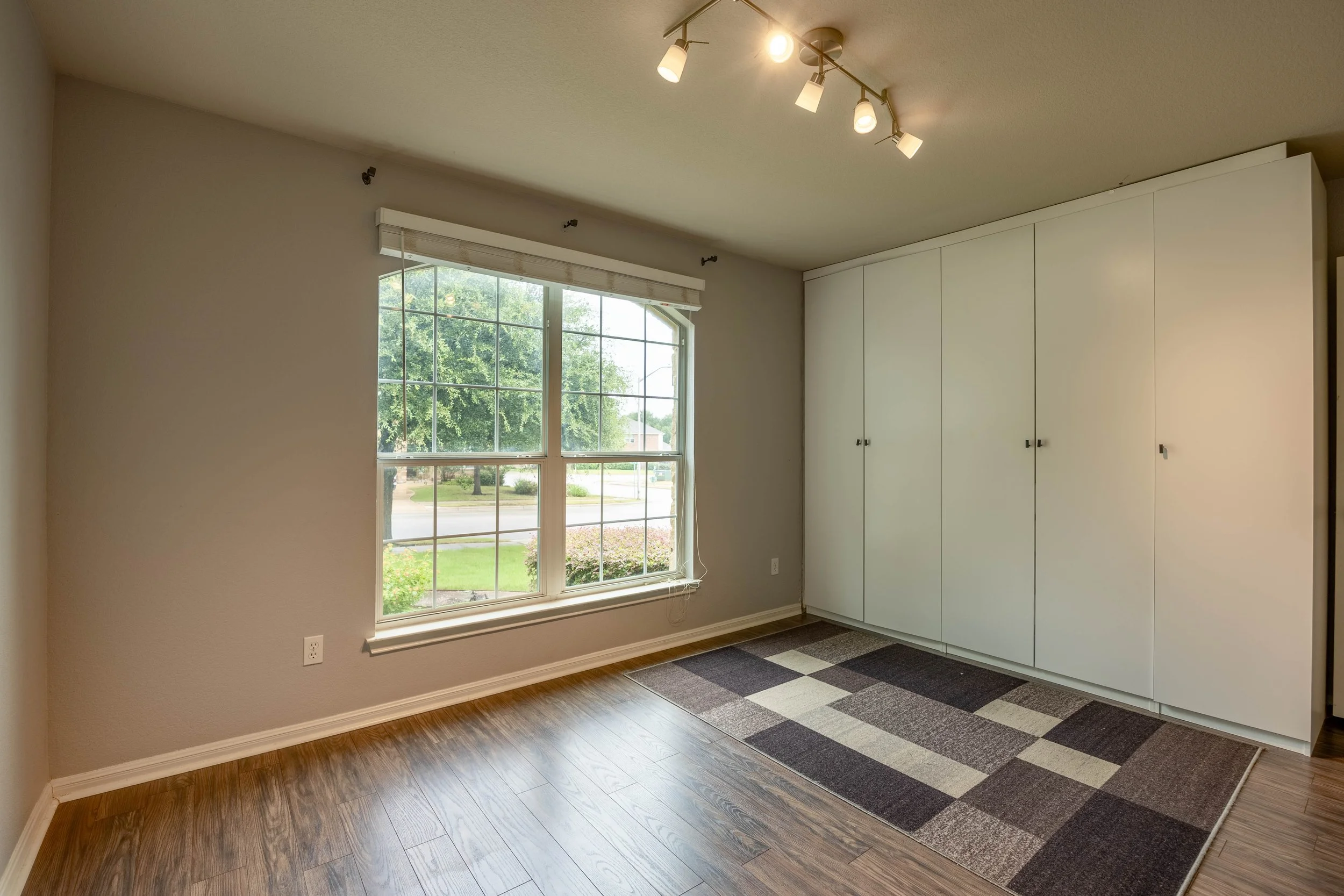 (13)_1301Rimstone_SecondBedroom.jpg