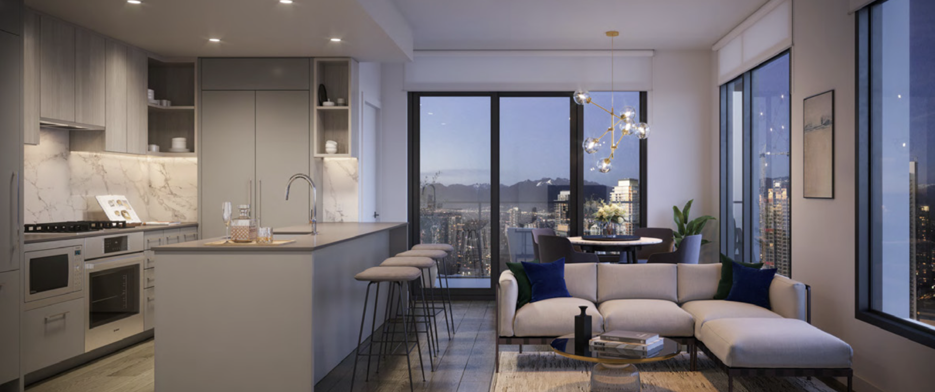 Modern high-rise apartment living room with kitchen, dining area, sofa with throw pillows, large windows showing cityscape and mountains at dusk, contemporary chandelier, decorative plants, and artwork.