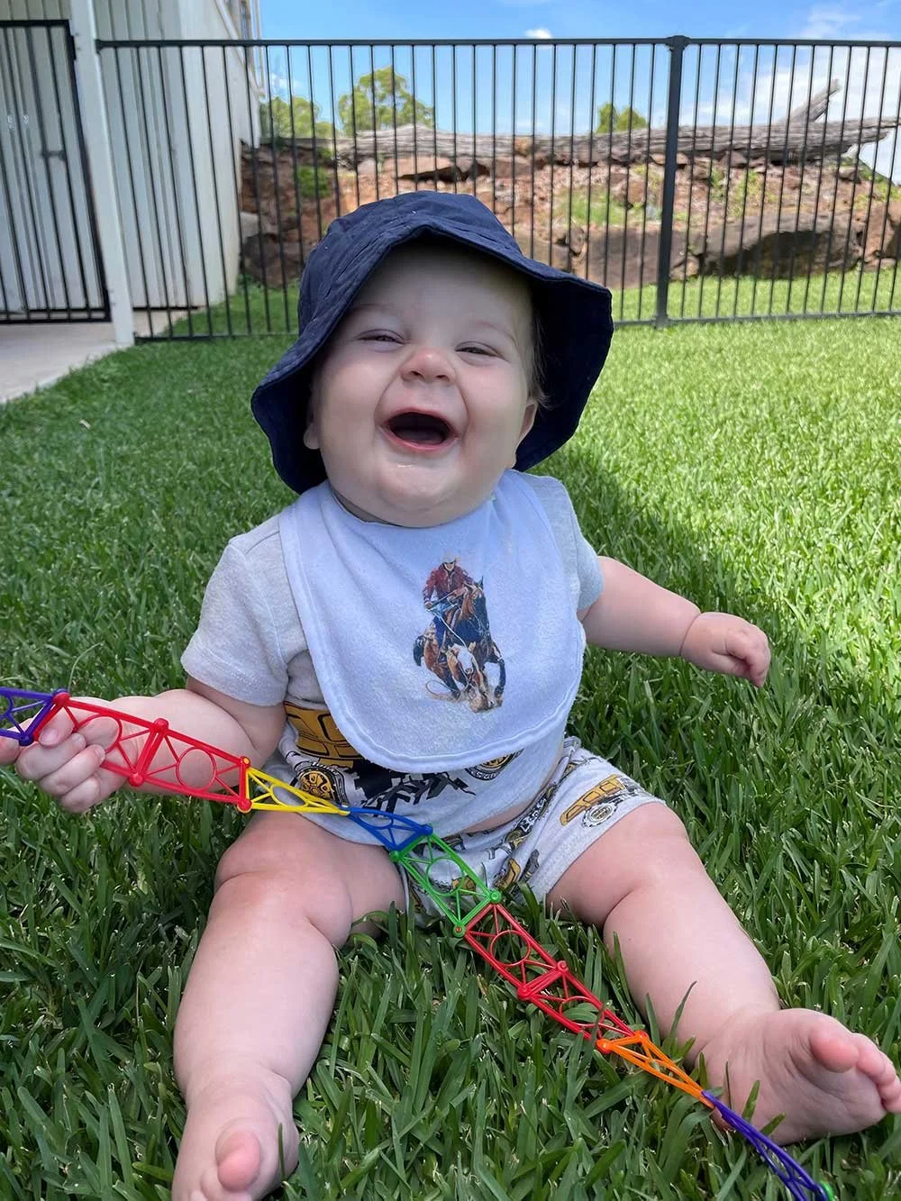 Cooper Loves Playing On The Soft Sir Walter Buffalo Grass.