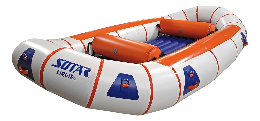 White and orange inflatable Sotar river raft with blue interior floor and grab handles